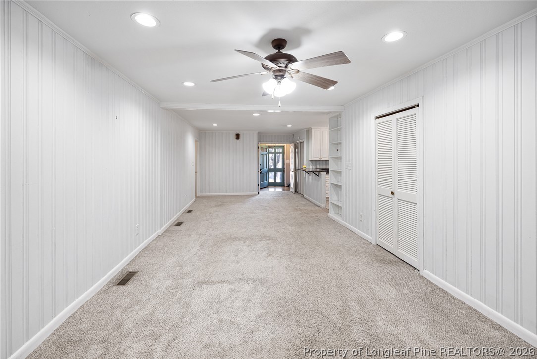 2527 Huntington Road Fayetteville, NC 28303 - Photo 18 of 39 en empty room with closet and fan