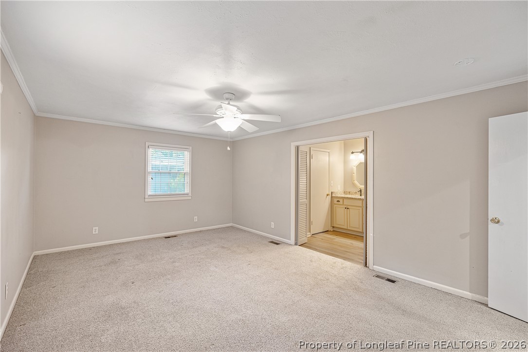 2527 Huntington Road Fayetteville, NC 28303 - Photo 20 of 39 a view of an empty room with a window
