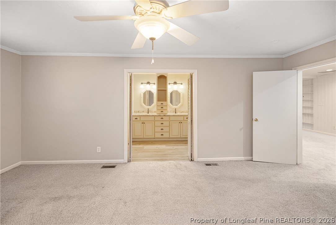 2527 Huntington Road Fayetteville, NC 28303 - Photo 21 of 39 a view of an empty room with a window
