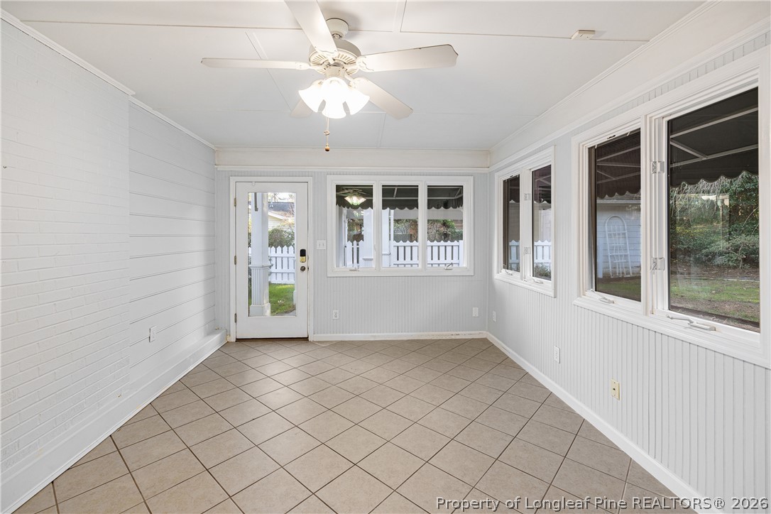 2527 Huntington Road Fayetteville, NC 28303 - Photo 34 of 39 an empty room with windows and fan