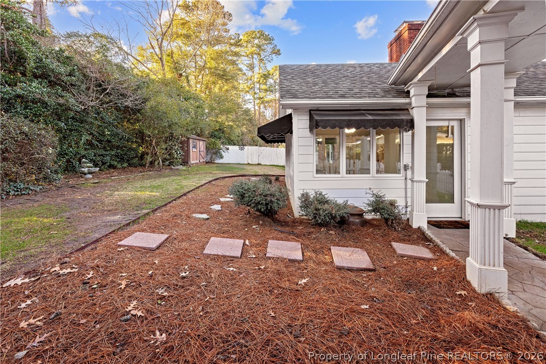 2527 Huntington Road Fayetteville, NC 28303 - Photo 39 of 39 a view of a house with backyard and sitting area