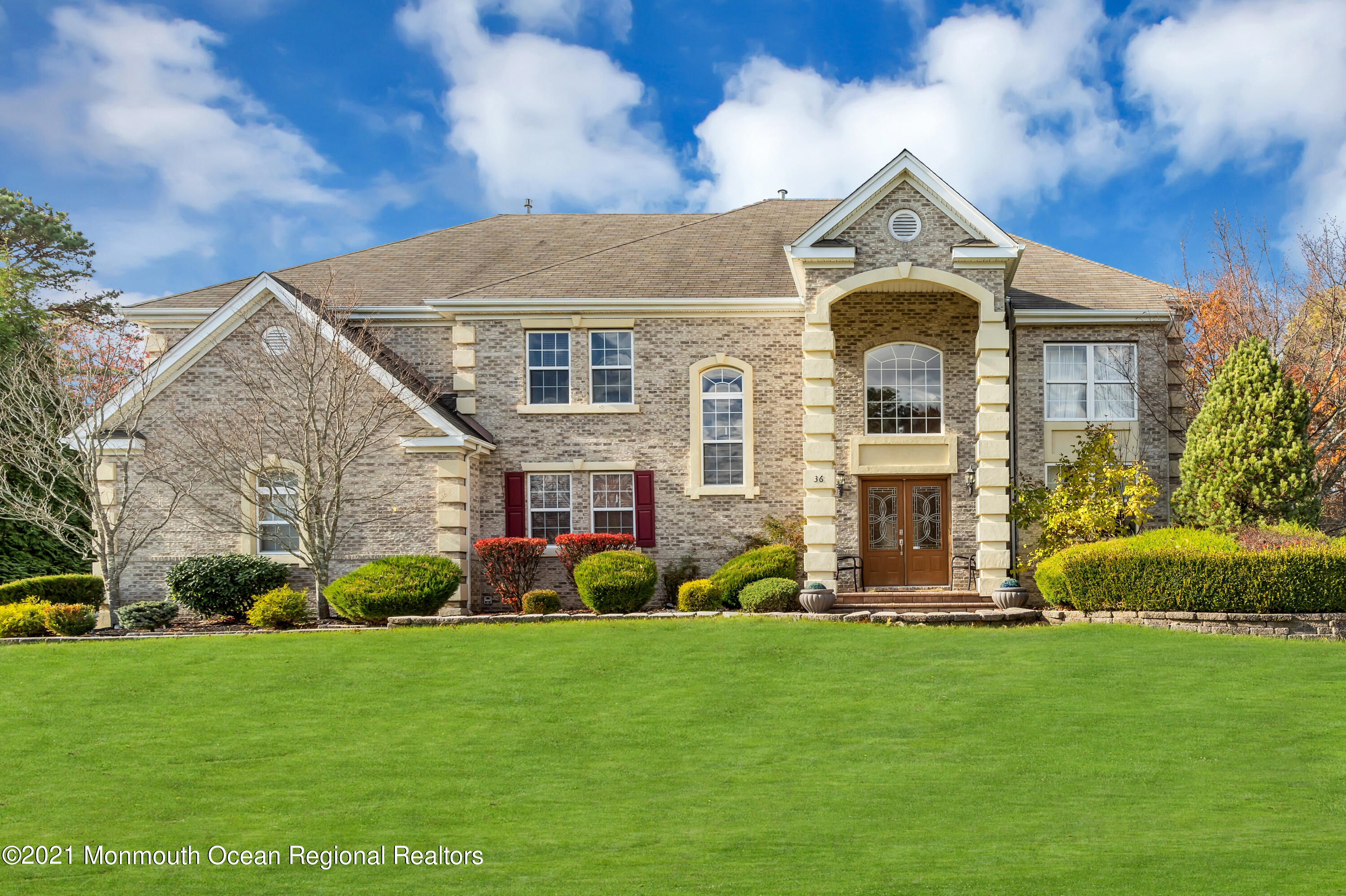 36 Woods Edge Drive Jackson, NJ 08527 - Photo 1 of 85 a front view of a house with a garden