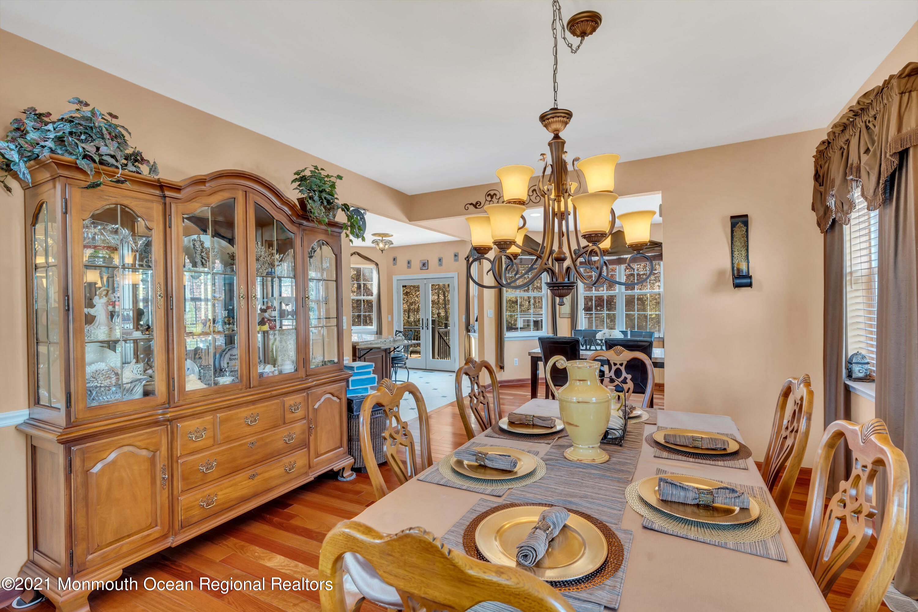 36 Woods Edge Drive Jackson, NJ 08527 - Photo 17 of 85 a dining room with furniture a chandelier and wooden floor