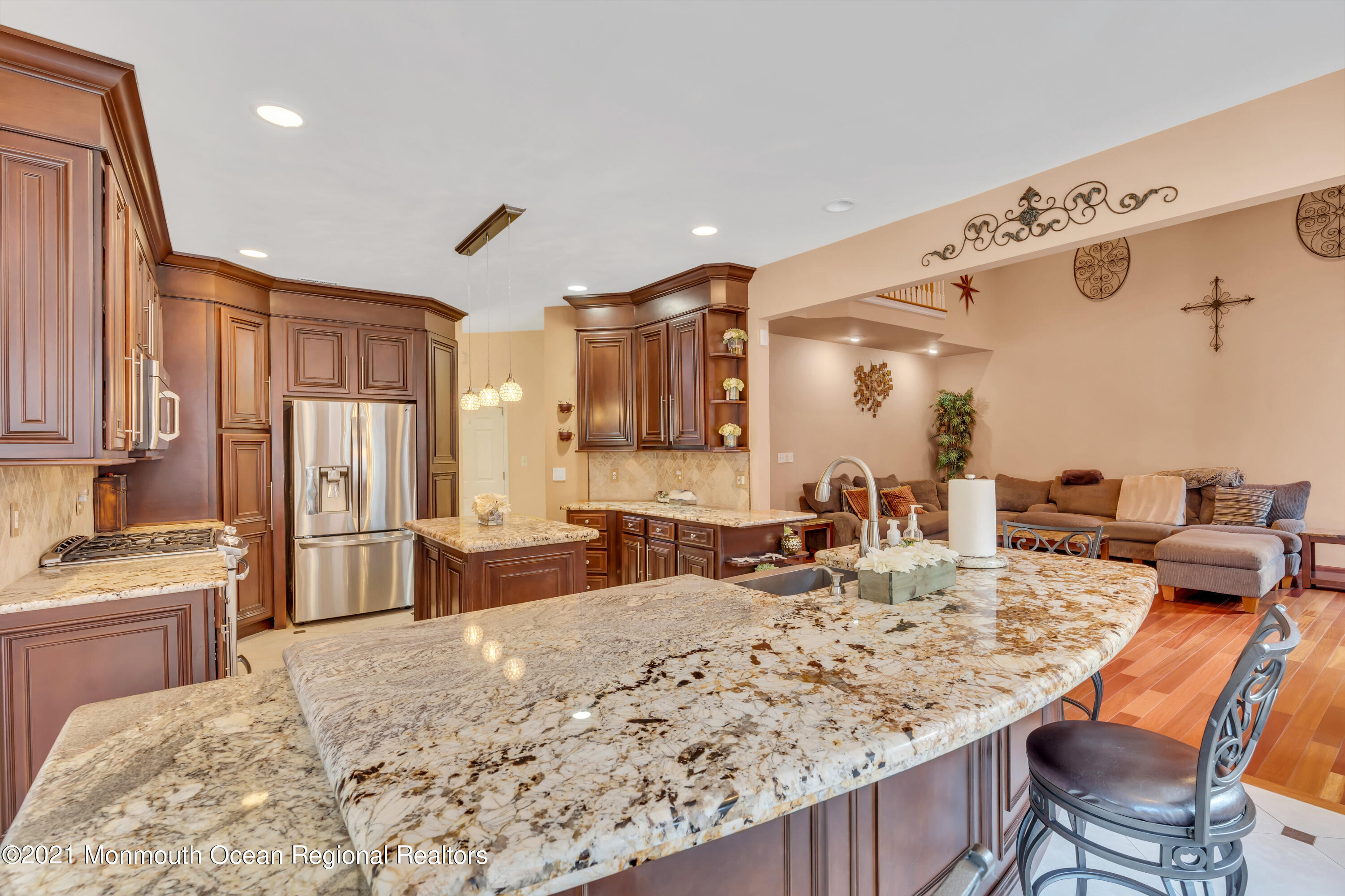 36 Woods Edge Drive Jackson, NJ 08527 - Photo 21 of 85 a kitchen with stainless steel appliances kitchen island granite countertop a sink stove and refrigerator