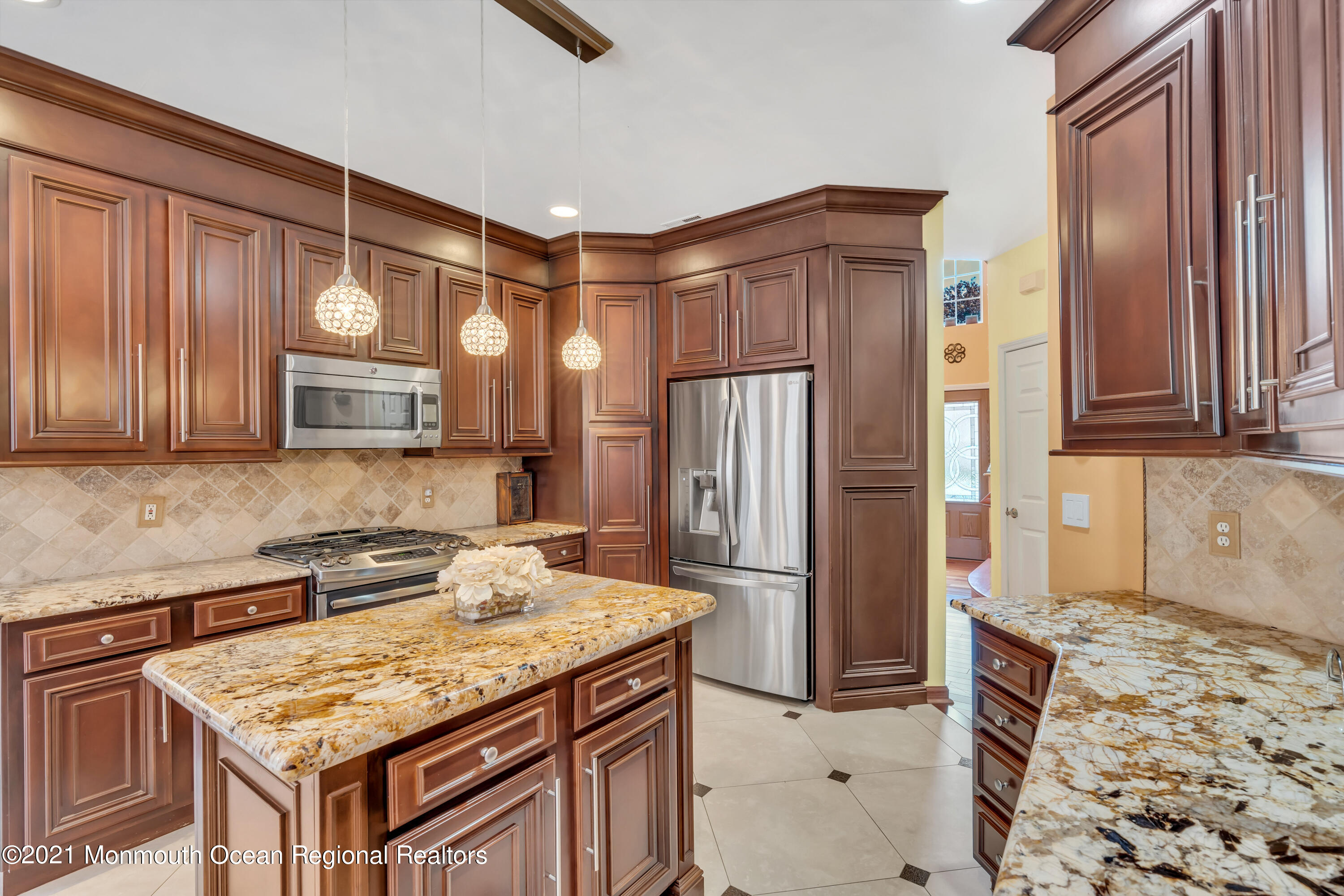 36 Woods Edge Drive Jackson, NJ 08527 - Photo 25 of 85 a kitchen with stainless steel appliances granite countertop a refrigerator and a stove top oven
