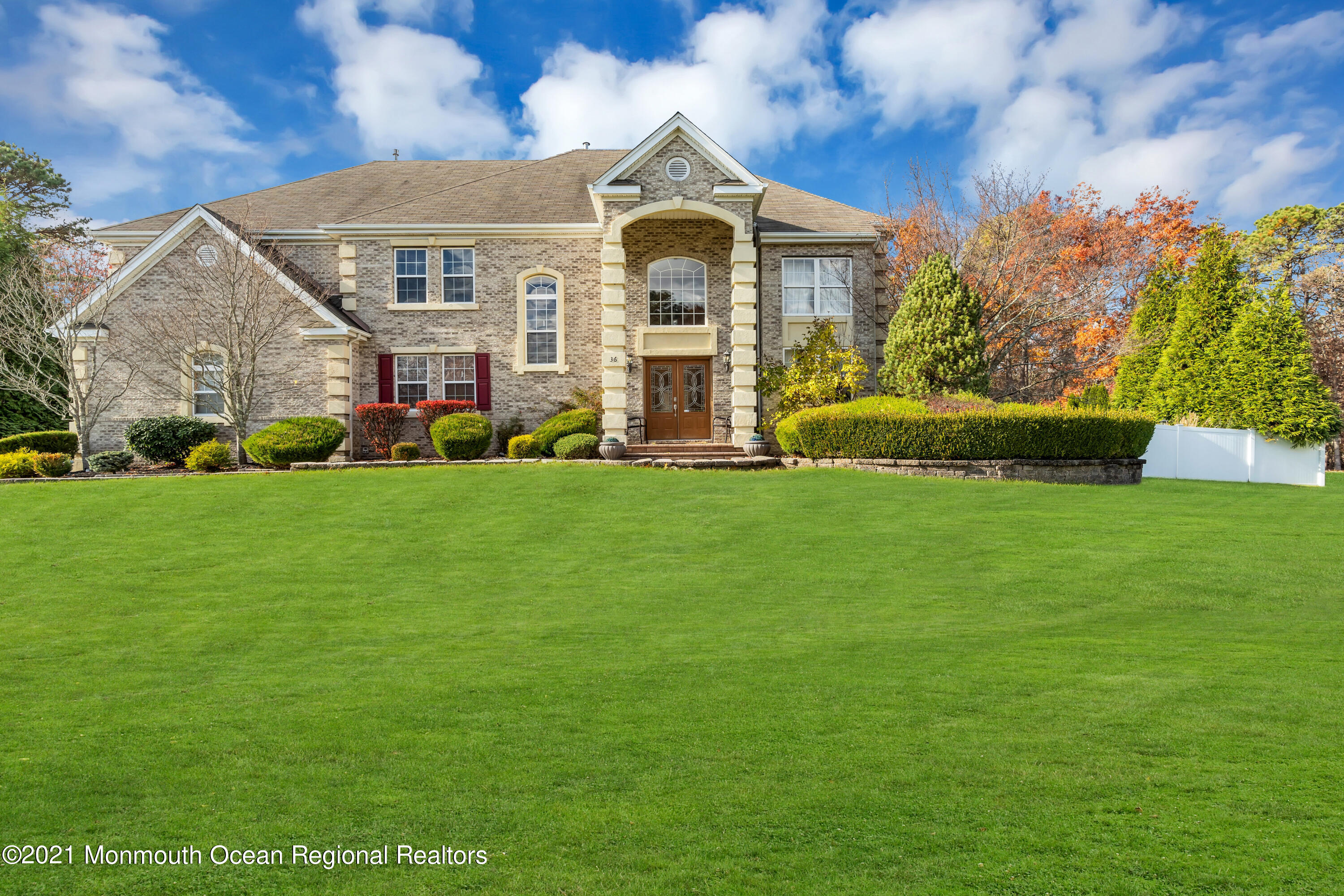 36 Woods Edge Drive Jackson, NJ 08527 - Photo 5 of 85 a front view of a house with a garden
