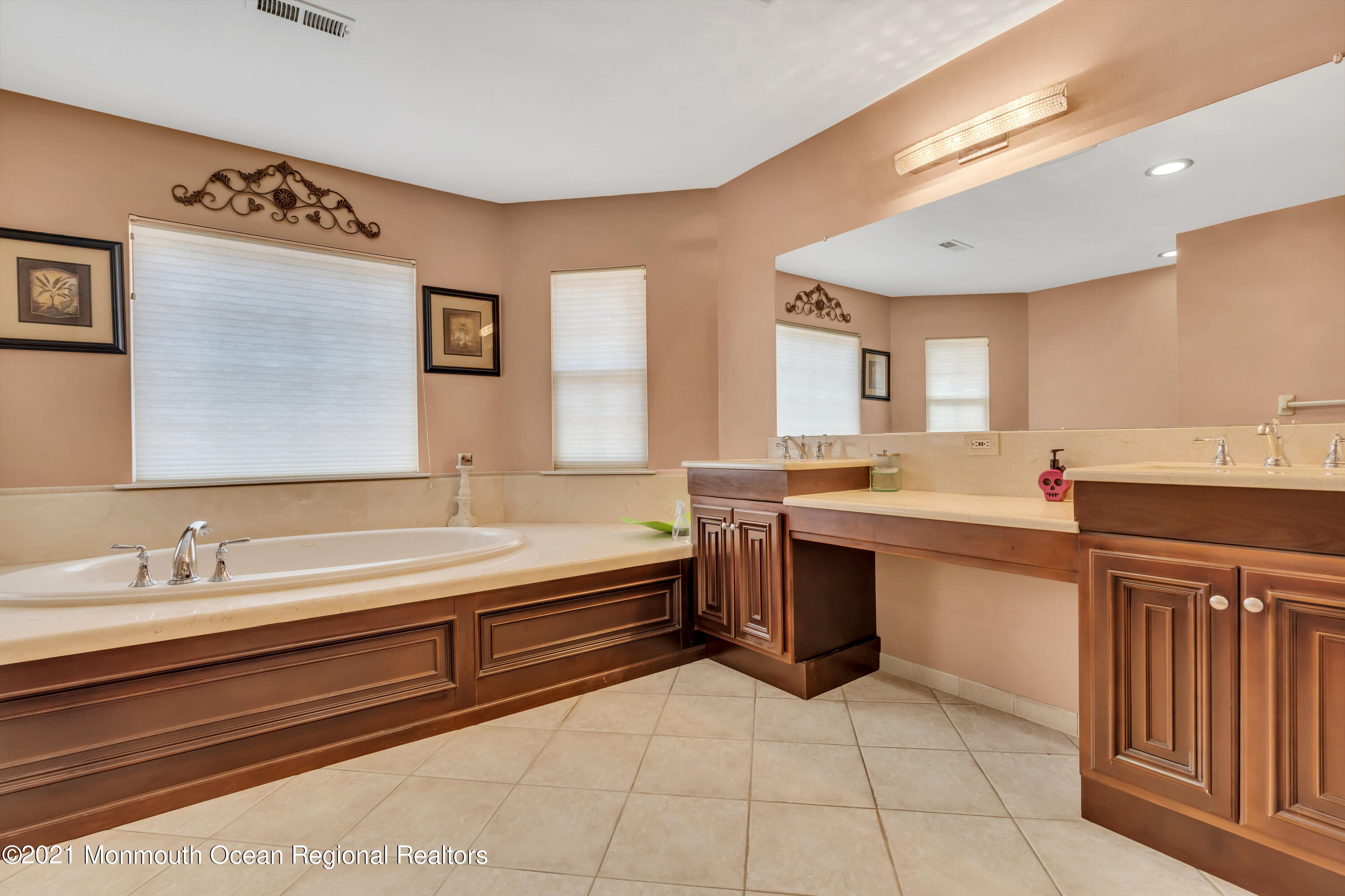 36 Woods Edge Drive Jackson, NJ 08527 - Photo 43 of 85 a large bathroom with a double vanity sink a mirror and a bathtub