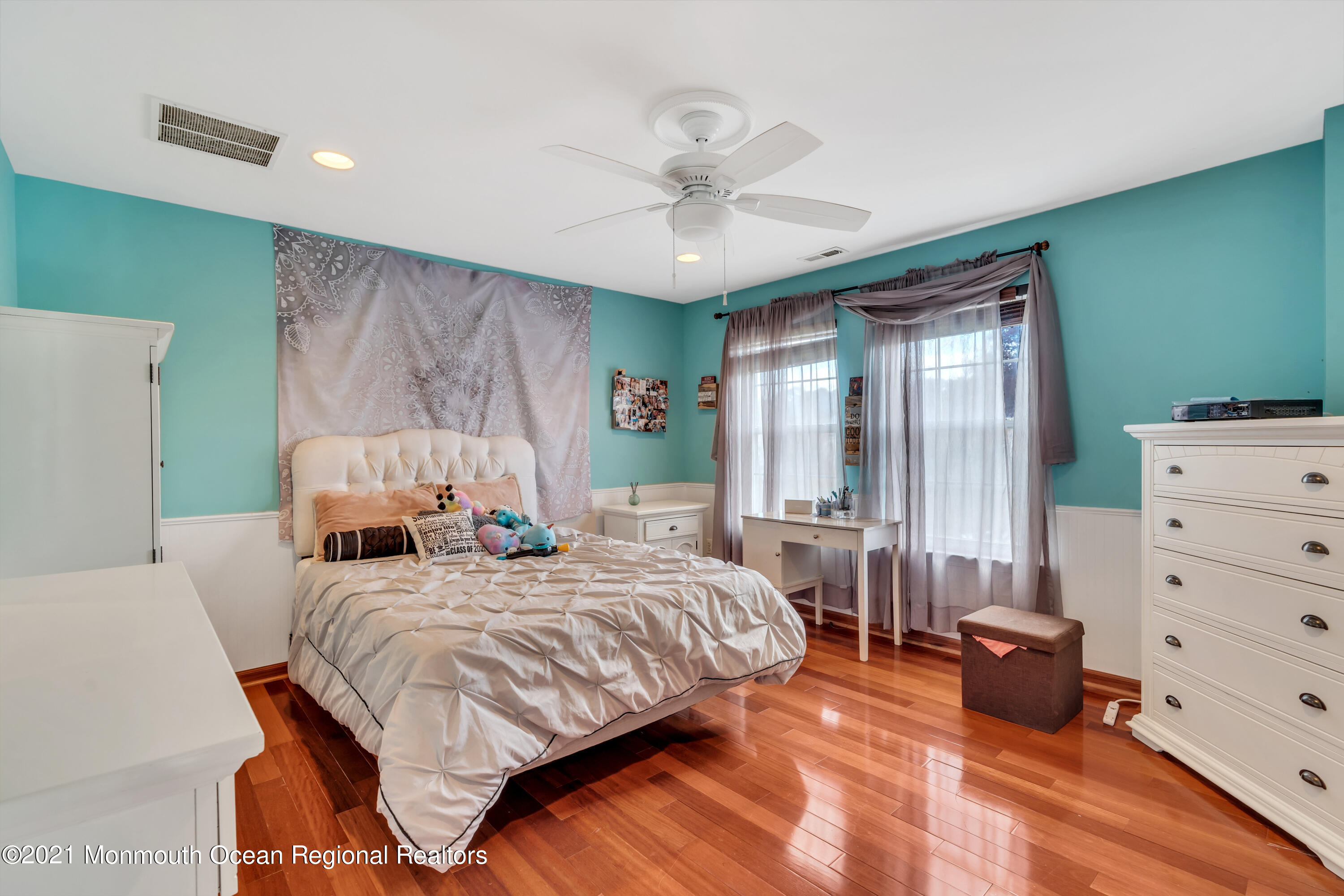 36 Woods Edge Drive Jackson, NJ 08527 - Photo 48 of 85 a bedroom with a bed and a chandelier