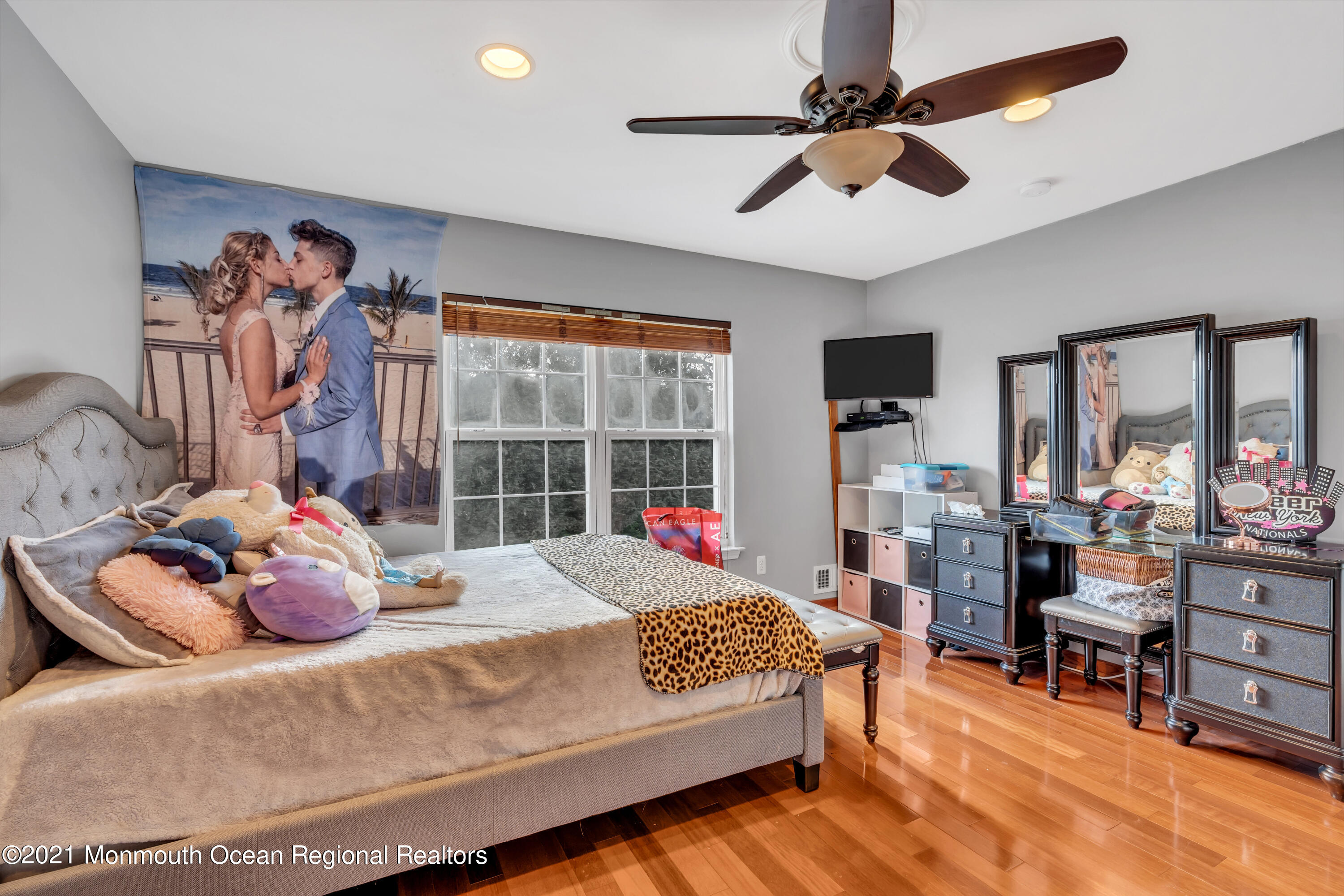 36 Woods Edge Drive Jackson, NJ 08527 - Photo 51 of 85 a bedroom with a bed and a chandelier