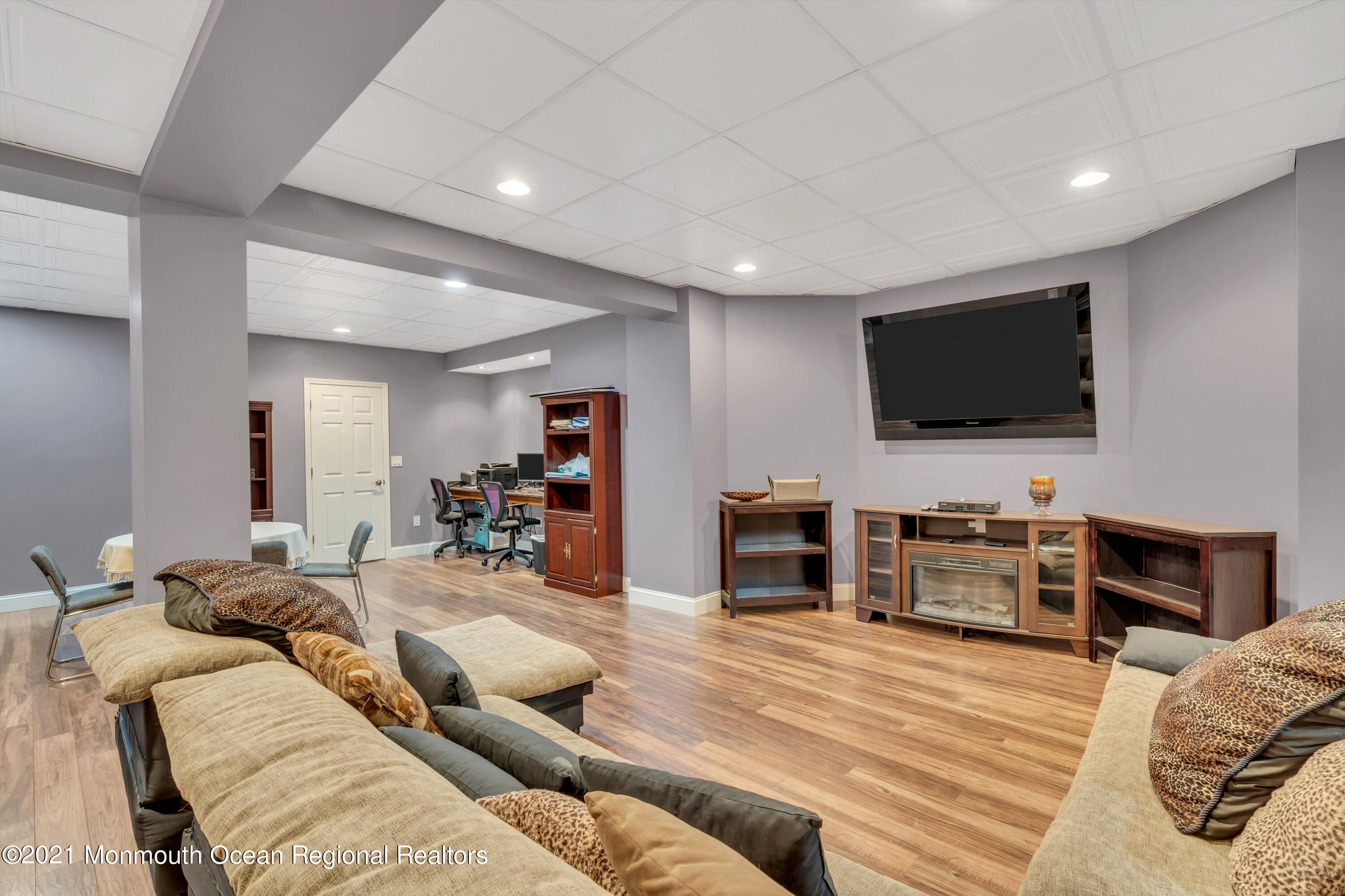 36 Woods Edge Drive Jackson, NJ 08527 - Photo 67 of 85 a living room with furniture and a flat screen tv