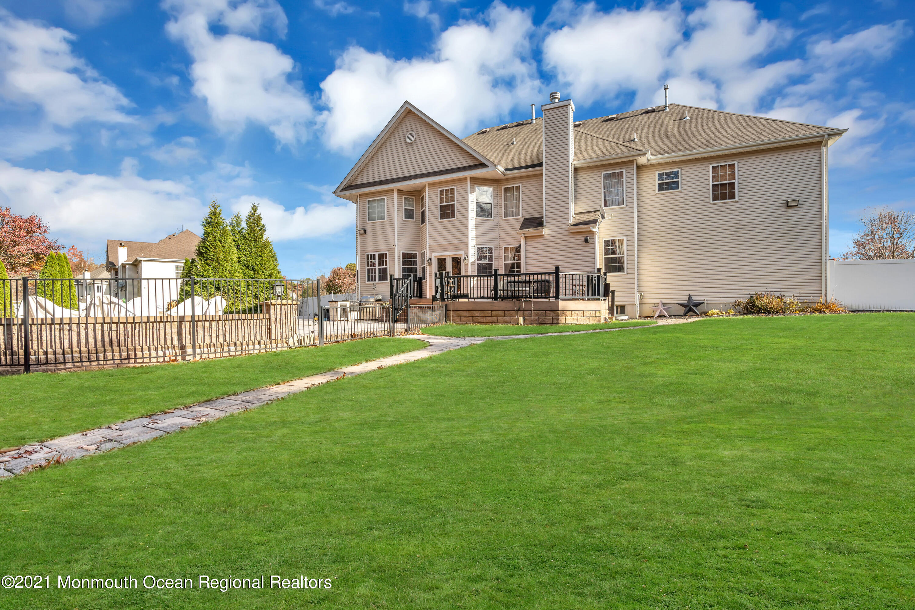 36 Woods Edge Drive Jackson, NJ 08527 - Photo 77 of 85 a view of a house with a yard and sitting area
