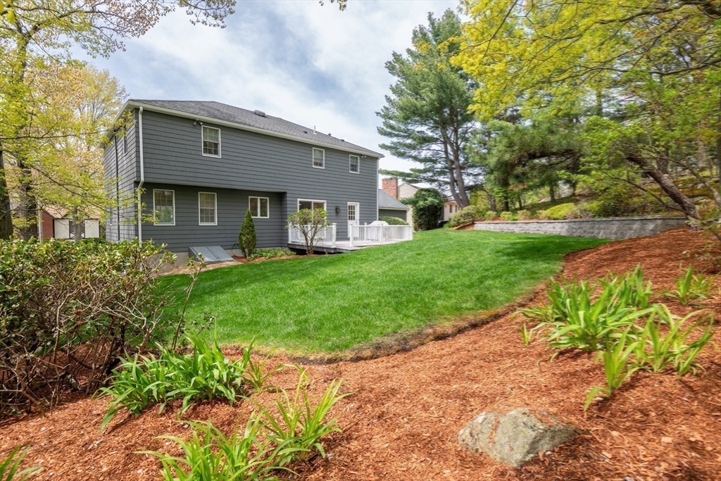 25 Ellen Road Stoneham, MA 02180 - Photo 35 of 41 a front view of a house with garden