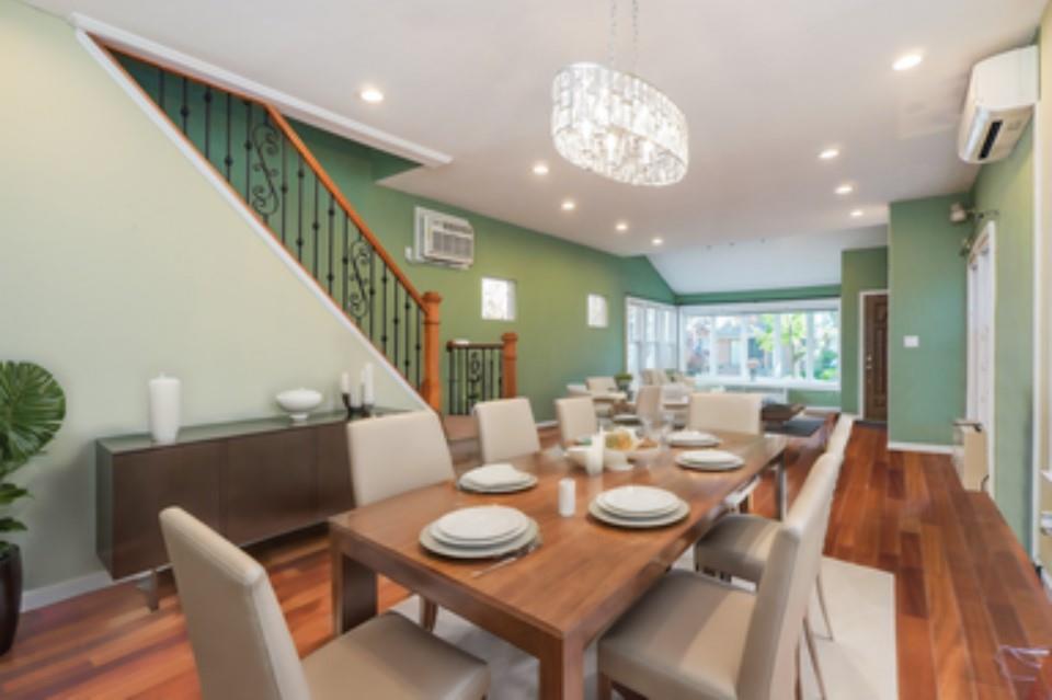 151 81st Street Brooklyn, NY 11209 - Photo 28 of 37 a view of a dining room with furniture a chandelier and wooden floor