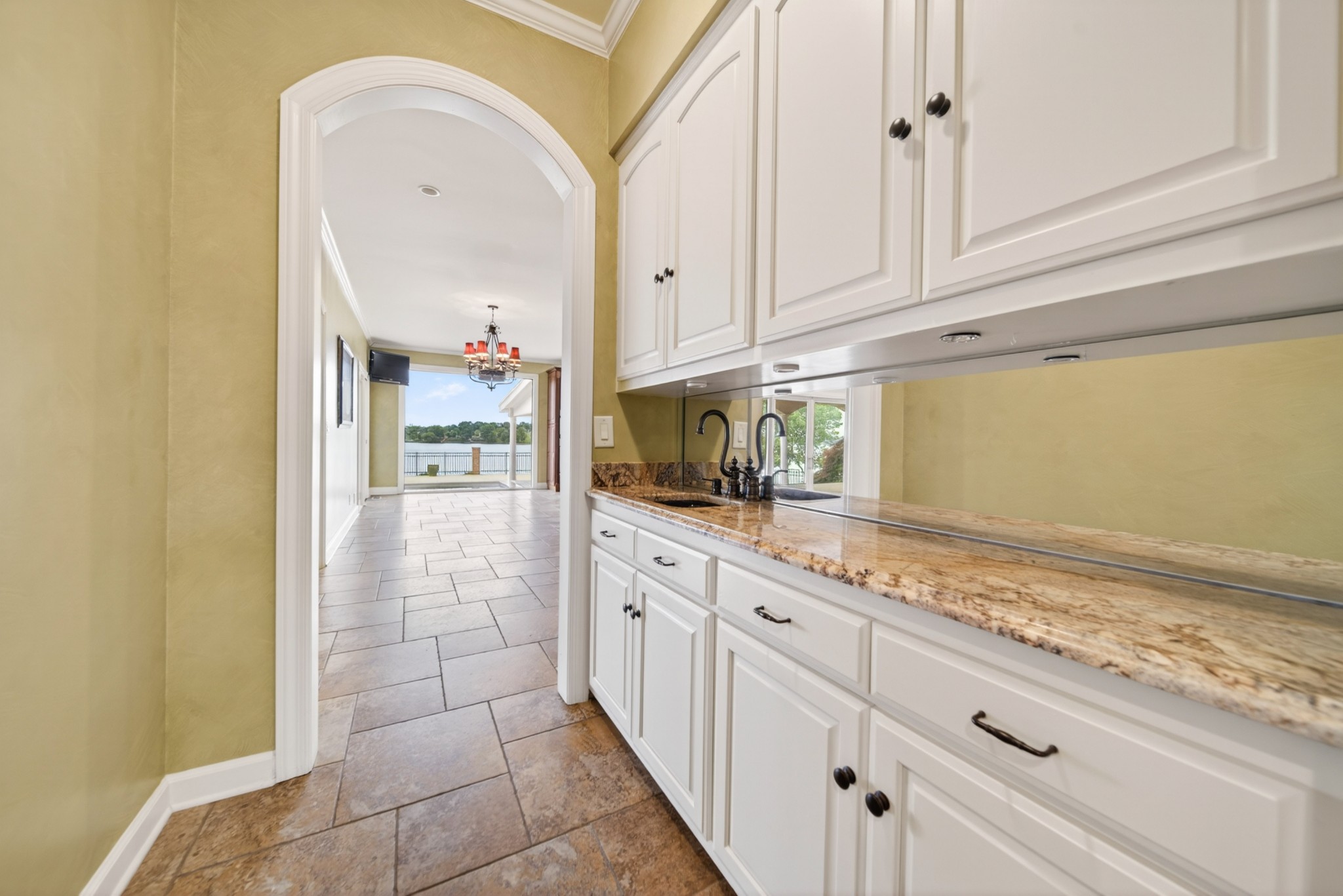 101 Kennett Road Old Hickory, TN 37138 - Photo 39 of 100 a kitchen with granite countertop a sink a stove and cabinets