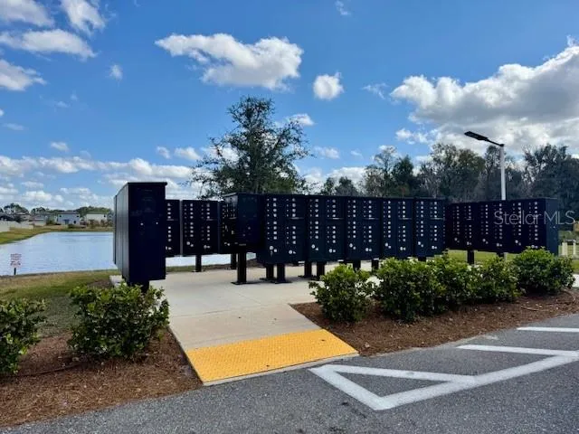 a view of a patio with swimming pool