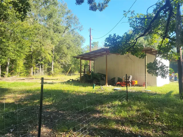 a room with furniture and a wooden floor