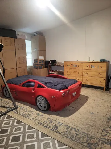 a room with pool table and flat screen tv