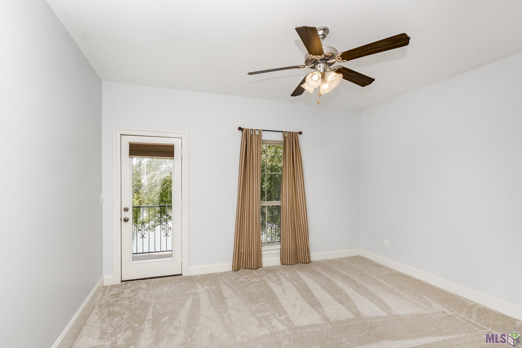 2007 Lac Cache Court Baton Rouge, LA 70816 - Photo 17 of 26 2nd upstairs bedroom w/balcony