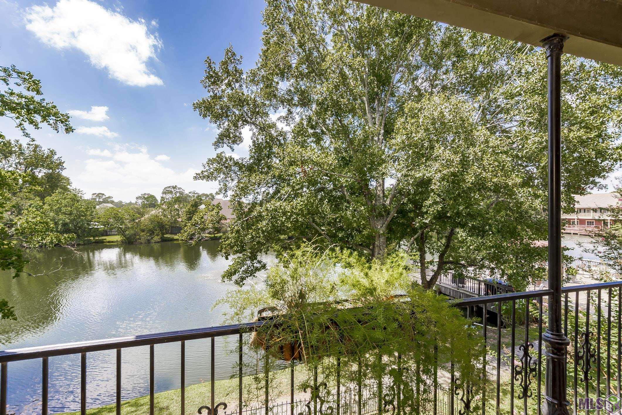 2007 Lac Cache Court Baton Rouge, LA 70816 - Photo 21 of 26 View of lake from upstairs balcony