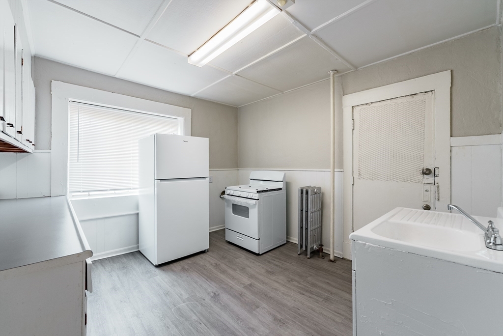 202-212 Pearl Street Springfield, MA 01105 - Photo 11 of 42 a view of storage and utility room with washer and dryer
