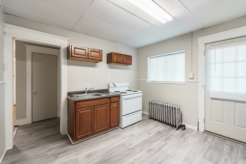 202-212 Pearl Street Springfield, MA 01105 - Photo 12 of 42 a view of a room with washer and dryer