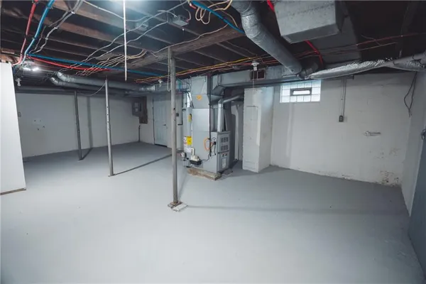 a view of an empty room with stairs