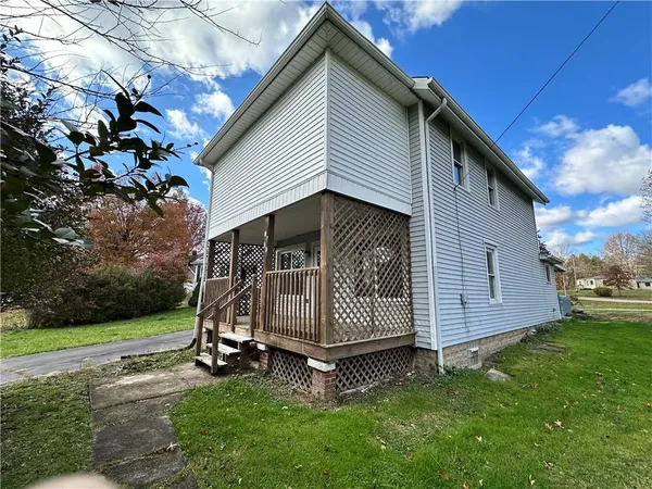 a view of a house with a garden