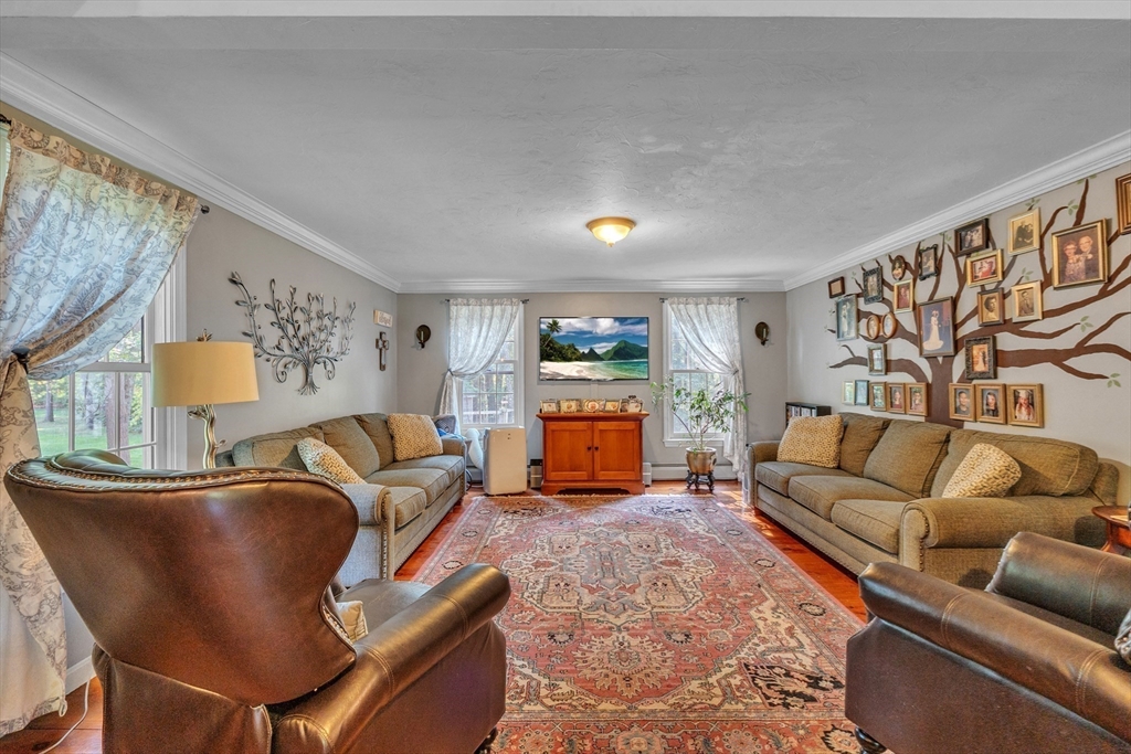 44 Buffum Road Charlton, MA 01507 - Photo 12 of 37 a living room with furniture and a couch