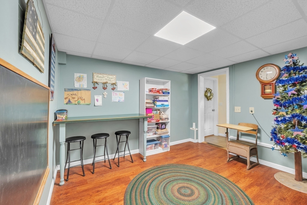 44 Buffum Road Charlton, MA 01507 - Photo 31 of 37 a living room with furniture and a fireplace
