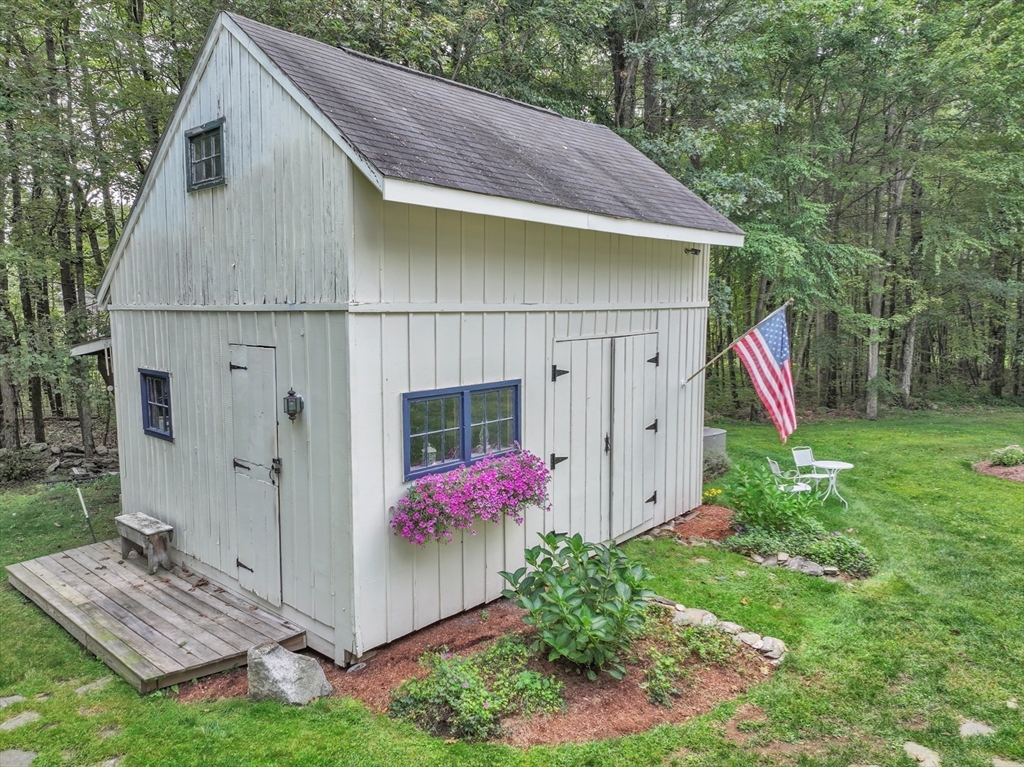 44 Buffum Road Charlton, MA 01507 - Photo 8 of 37 a view of small house along with yard