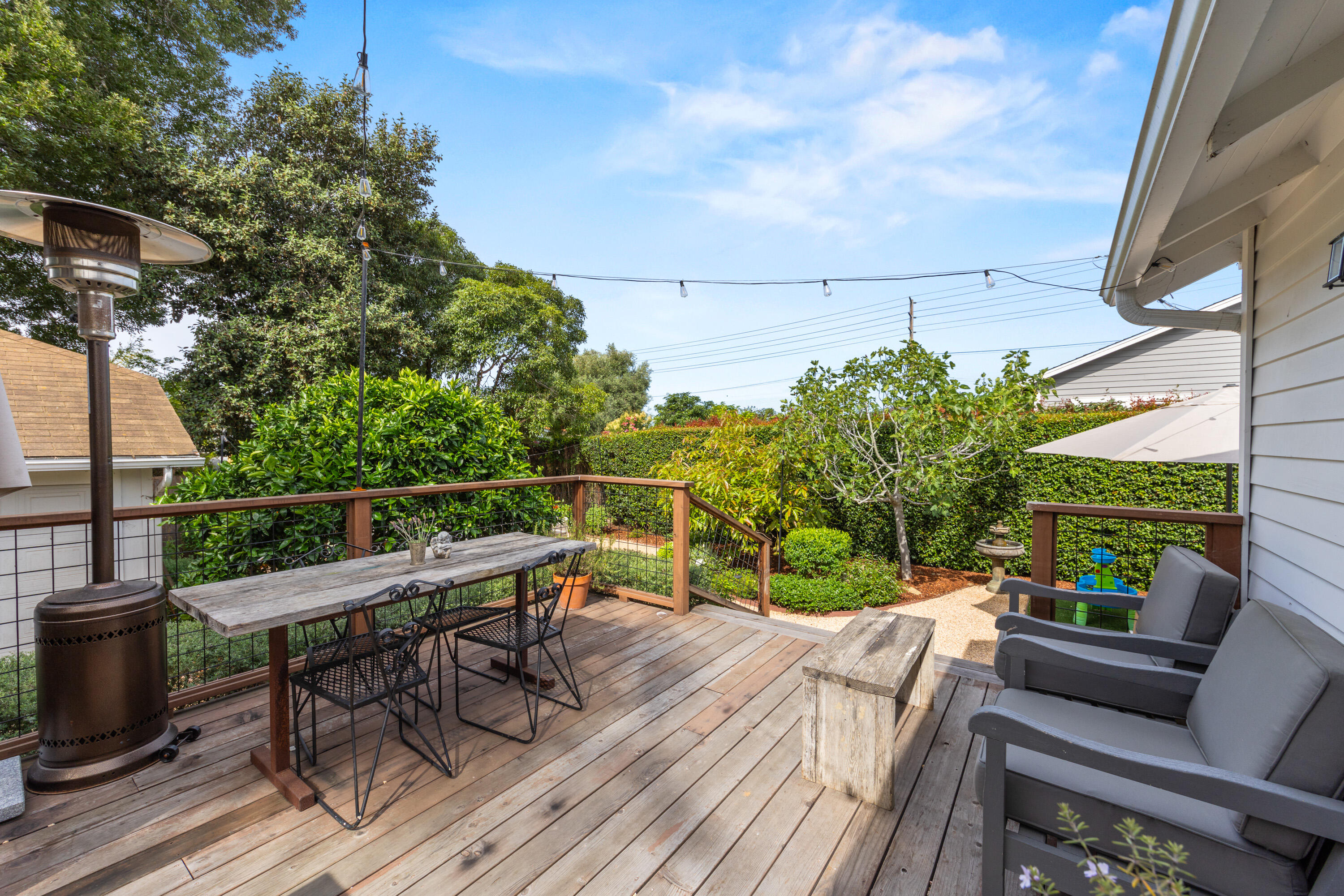 321 North Soledad Street Santa Barbara, CA 93103 - Photo 15 of 25 a view of a patio with couches potted plants and wooden floor