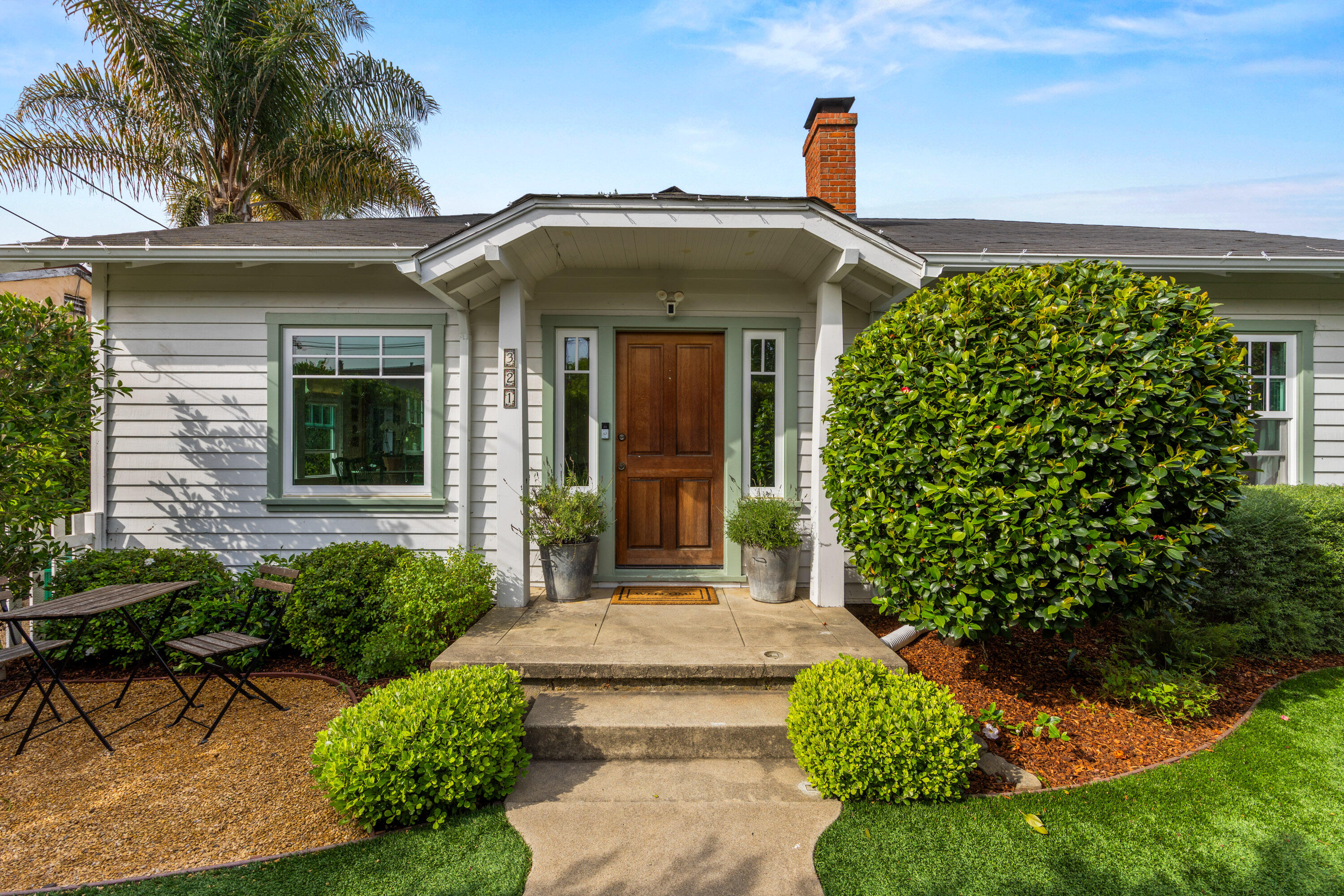 321 North Soledad Street Santa Barbara, CA 93103 - Photo 2 of 25 a front view of a house with garden