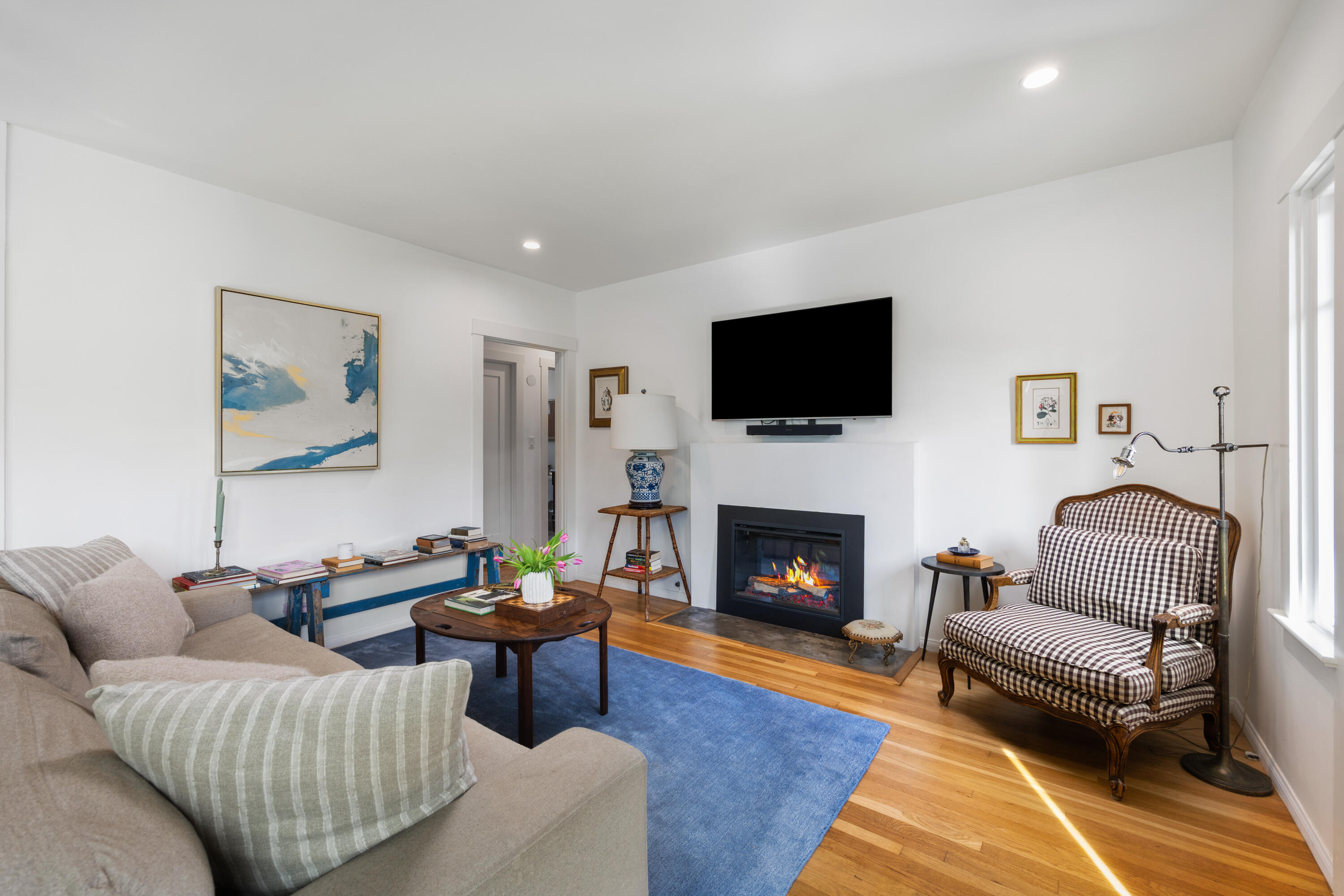321 North Soledad Street Santa Barbara, CA 93103 - Photo 4 of 25 a living room with furniture and a fireplace