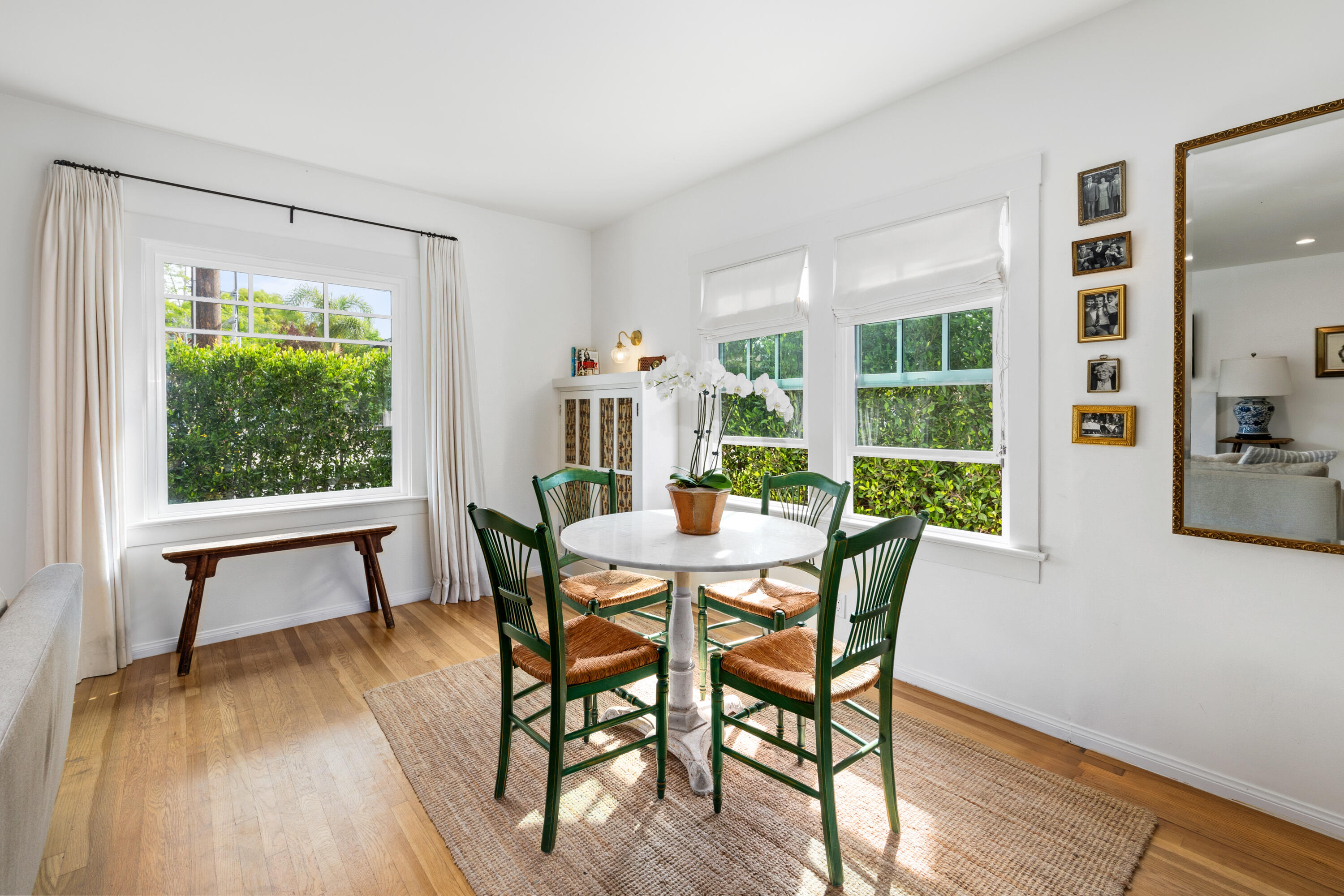 321 North Soledad Street Santa Barbara, CA 93103 - Photo 7 of 25 a view of a dining room with furniture window and wooden floor