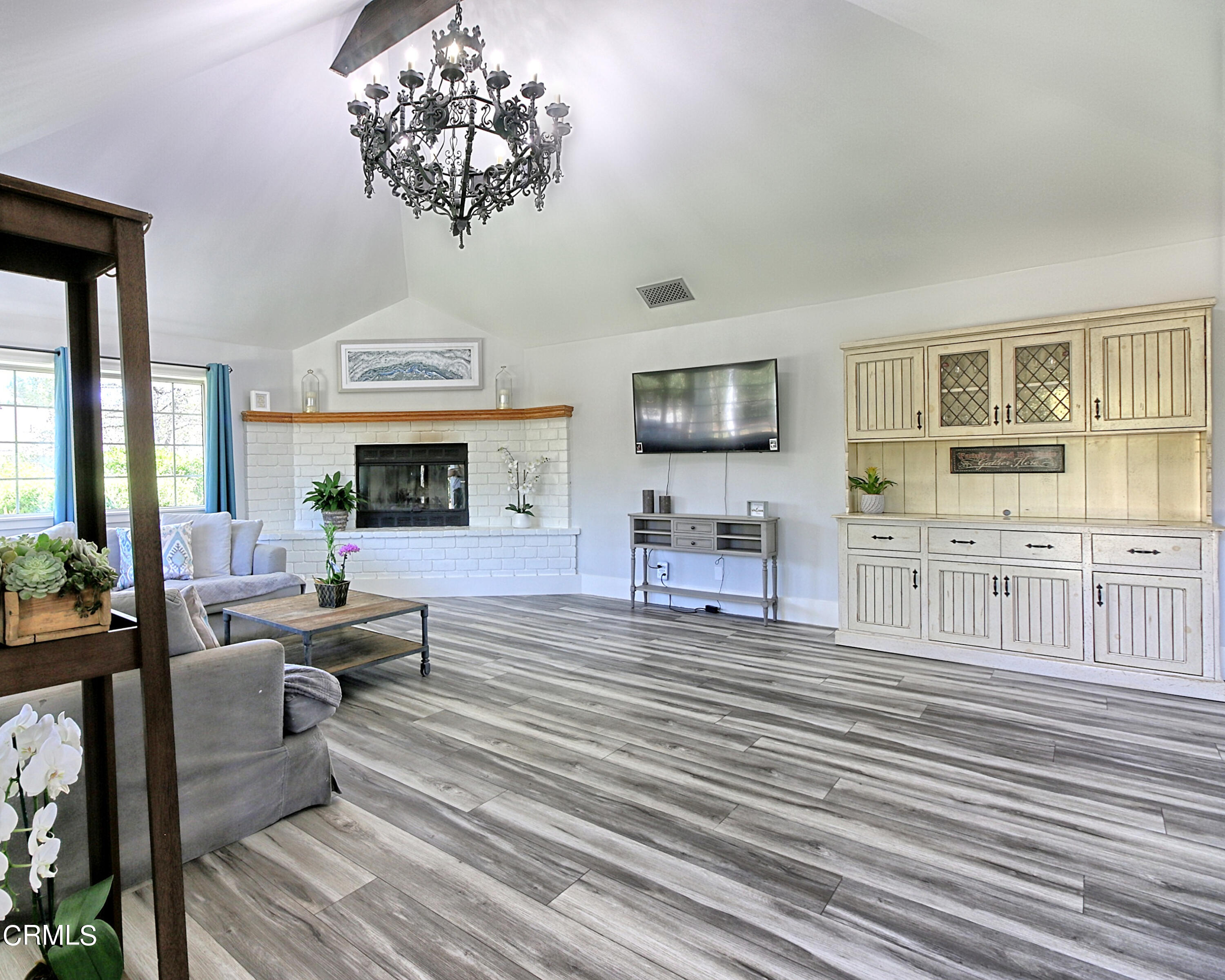 1159 Spring Street Oak View, CA 93022 - Photo 3 of 38 a living room with furniture and a flat screen tv