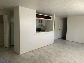 19509 Gunners Branch Road, Unit B Germantown, MD 20876 - Photo 6 of 25 a view of an empty room