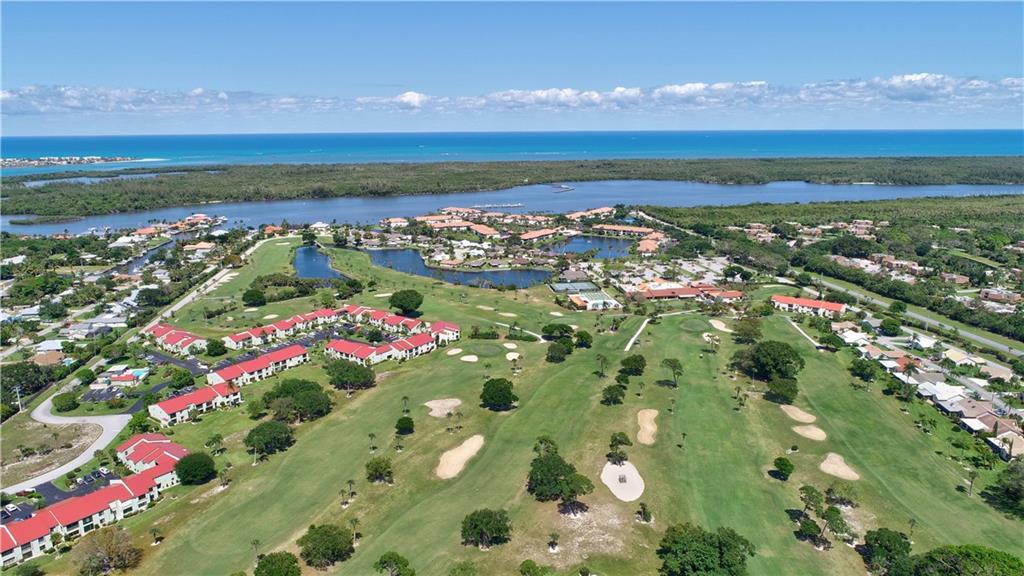 5433 Southeast Miles Grant Road, Unit E203 Stuart, FL 34997 - Photo 38 of 42 a view of city and an ocean