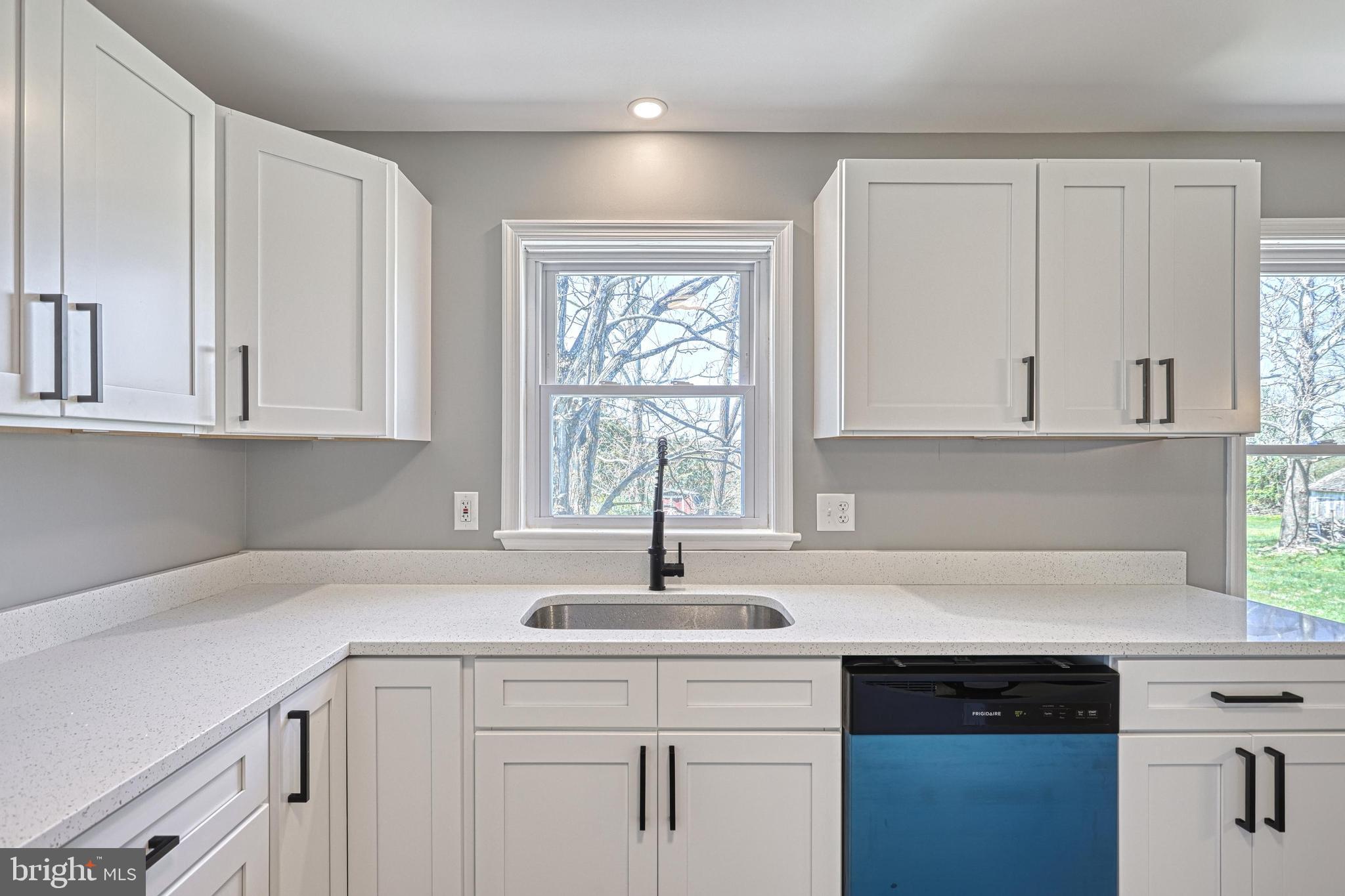 35 Herrs Ridge Road Gettysburg, PA 17325 - Photo 15 of 66 a kitchen with white cabinets and a window