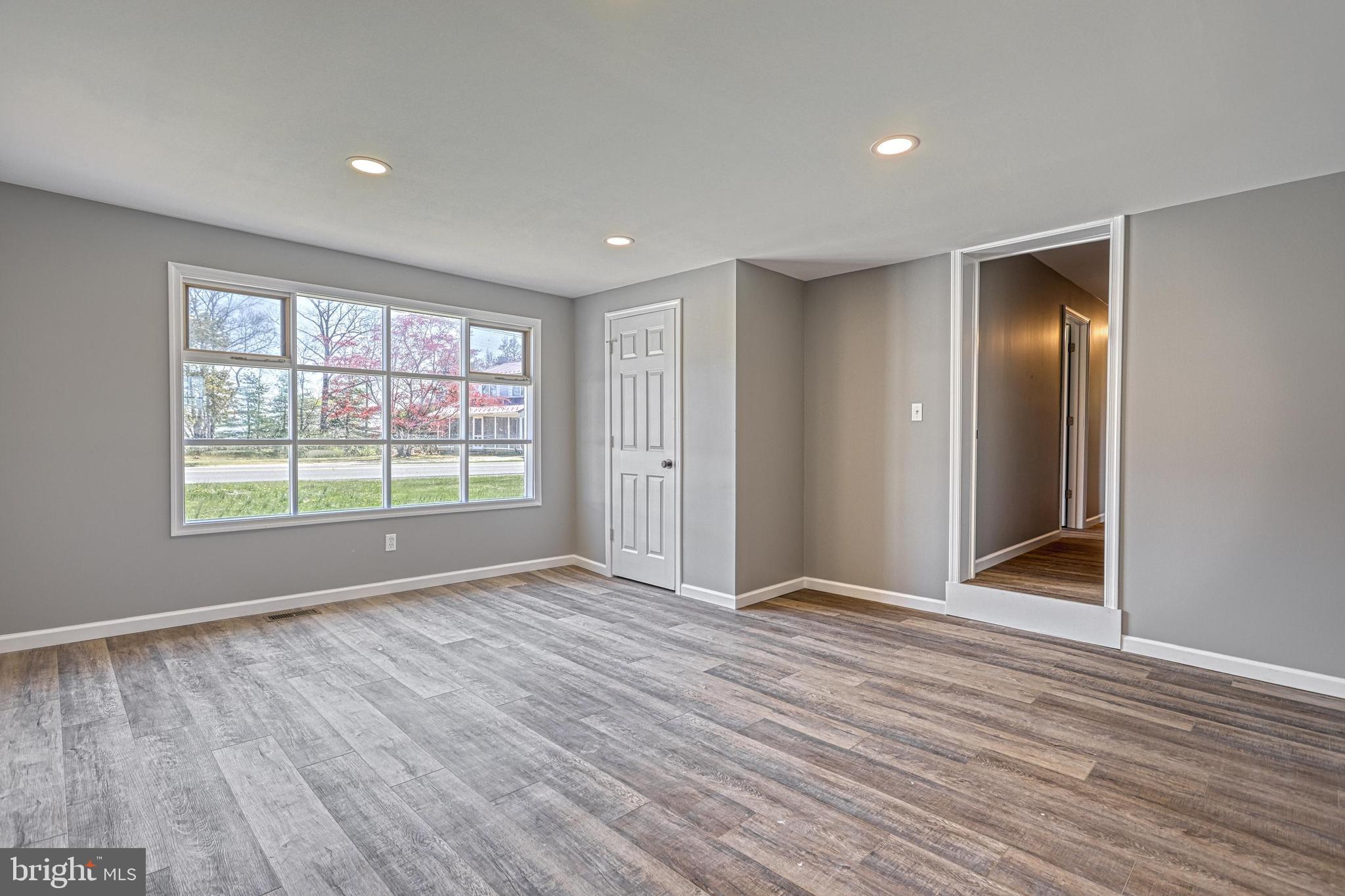 35 Herrs Ridge Road Gettysburg, PA 17325 - Photo 23 of 66 a view of an empty room with wooden floor and window