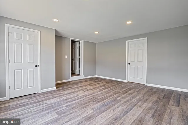 a bathroom with a toilet shower and a window