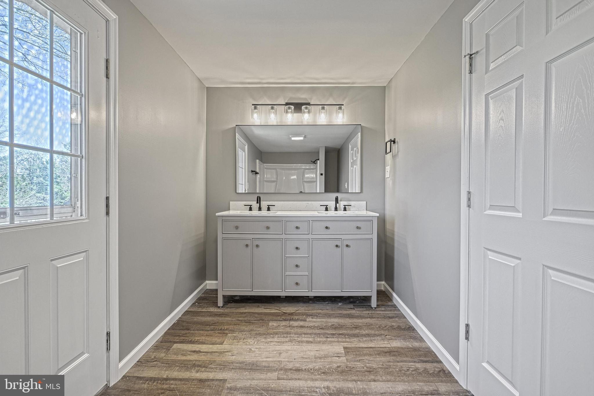 35 Herrs Ridge Road Gettysburg, PA 17325 - Photo 25 of 66 a bathroom with a sink and a mirror
