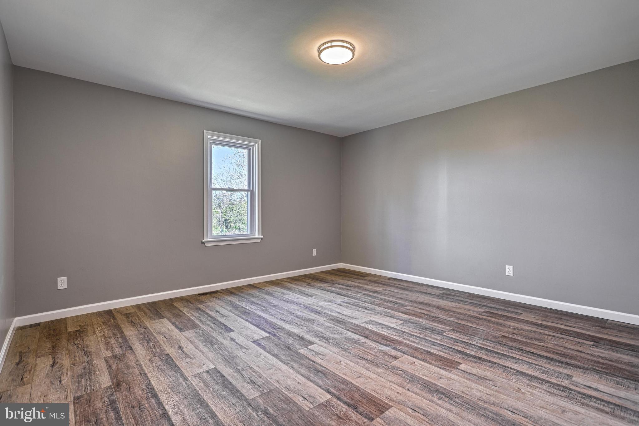 35 Herrs Ridge Road Gettysburg, PA 17325 - Photo 27 of 66 a view of room with window and wooden floor