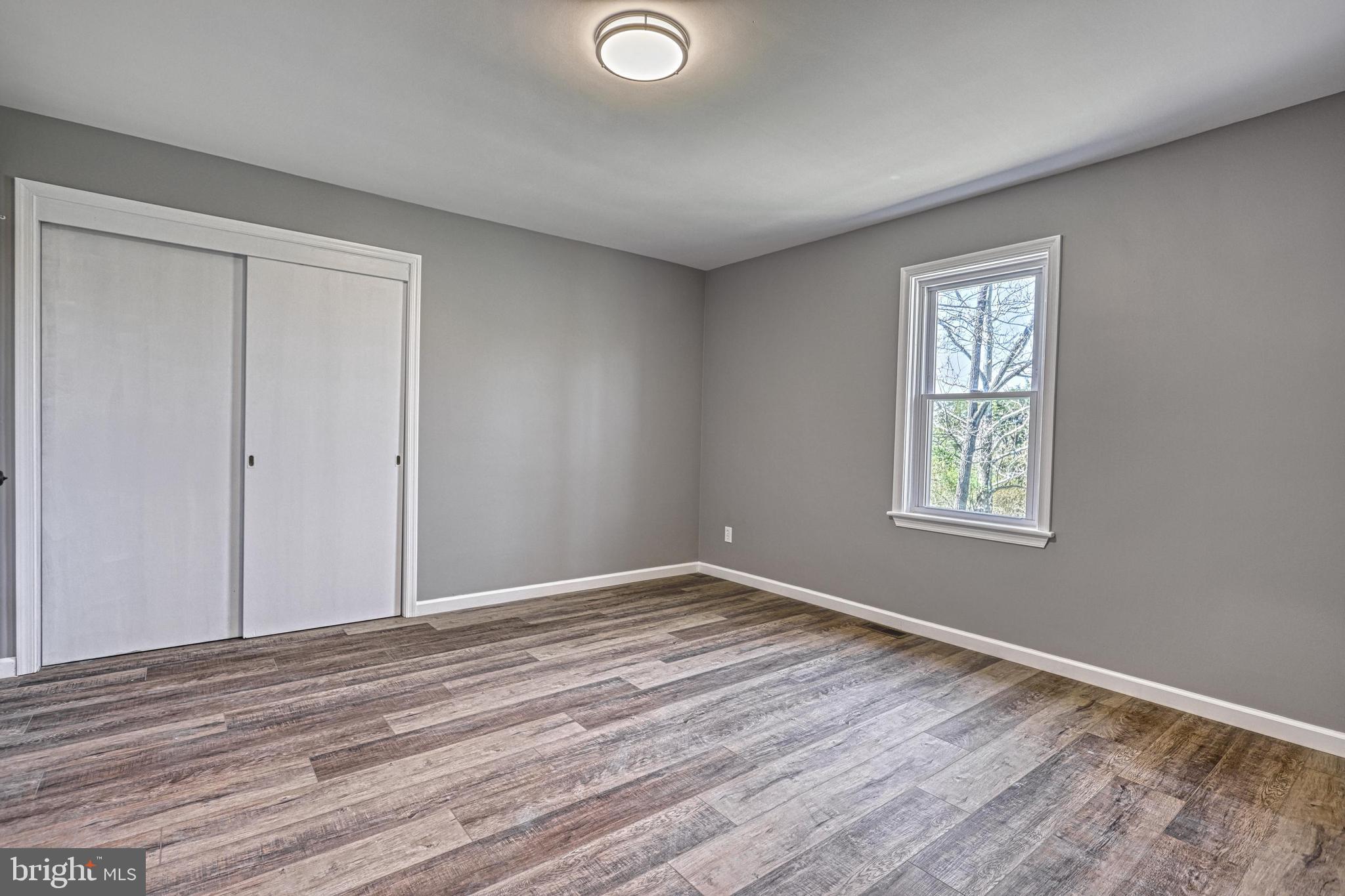 35 Herrs Ridge Road Gettysburg, PA 17325 - Photo 28 of 66 a view of empty room with wooden floor and fan