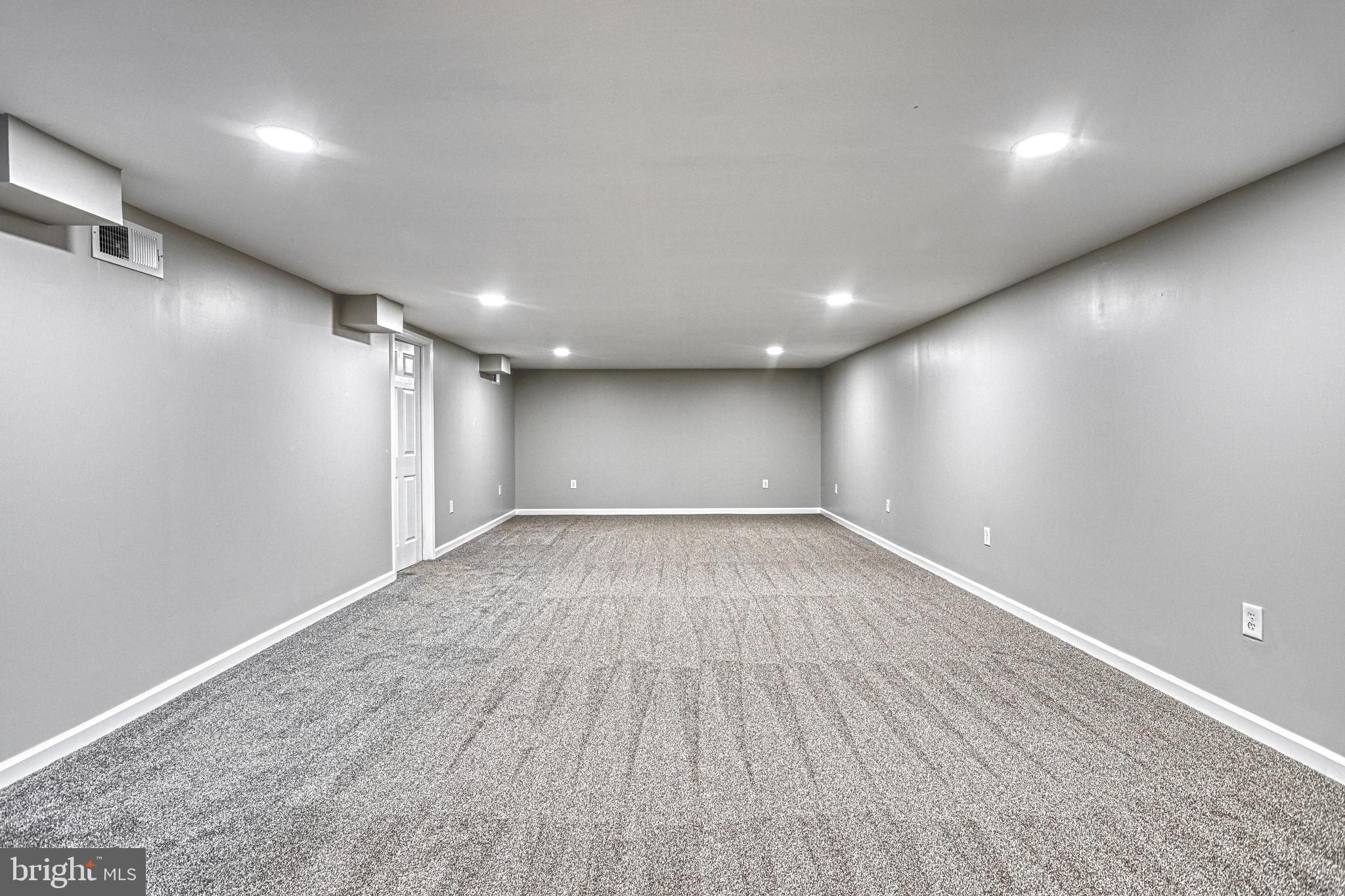 35 Herrs Ridge Road Gettysburg, PA 17325 - Photo 42 of 66 an empty room with wooden floor and windows