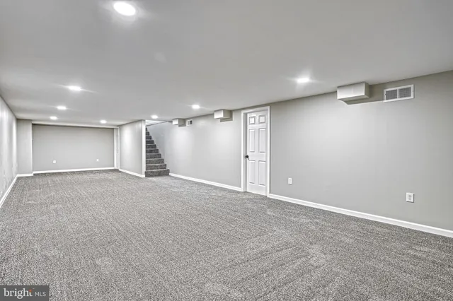 an aerial view of a house with a garden