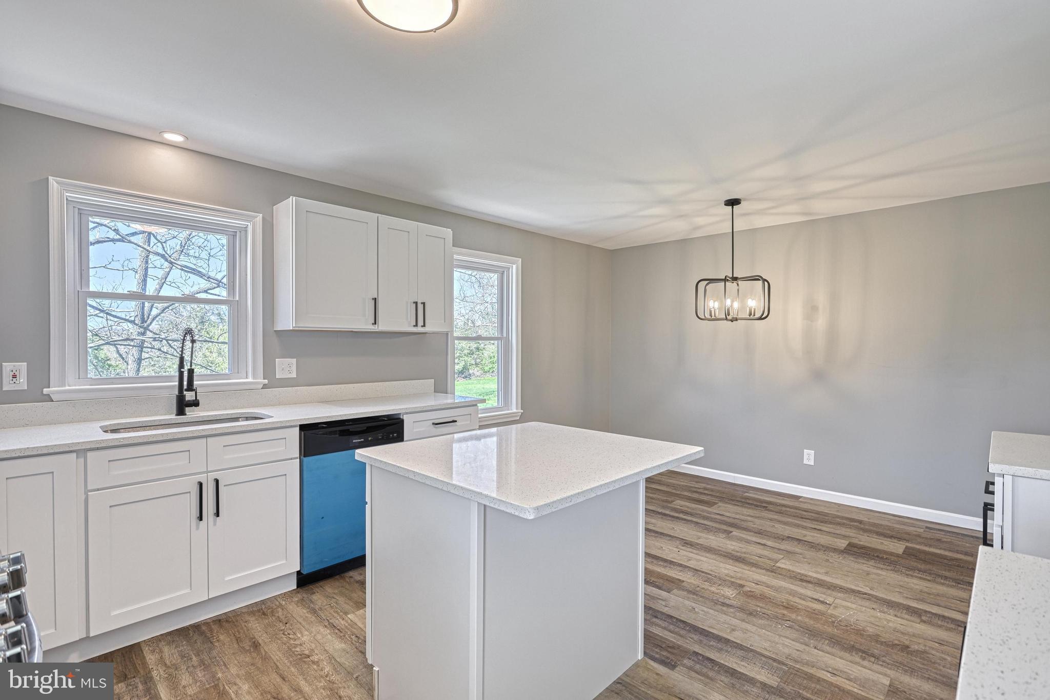 35 Herrs Ridge Road Gettysburg, PA 17325 - Photo 7 of 66 a kitchen with a sink stove and cabinets