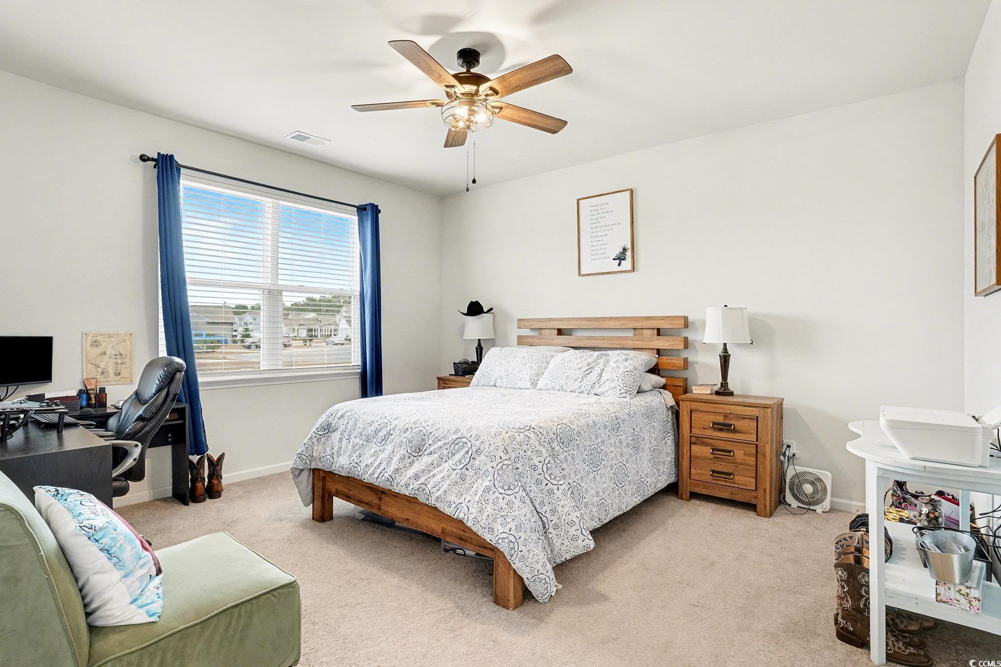 3923 Nandina Court Conway, SC 29526 - Photo 13 of 28 Bedroom with a desk, carpet flooring, and ceiling fan
