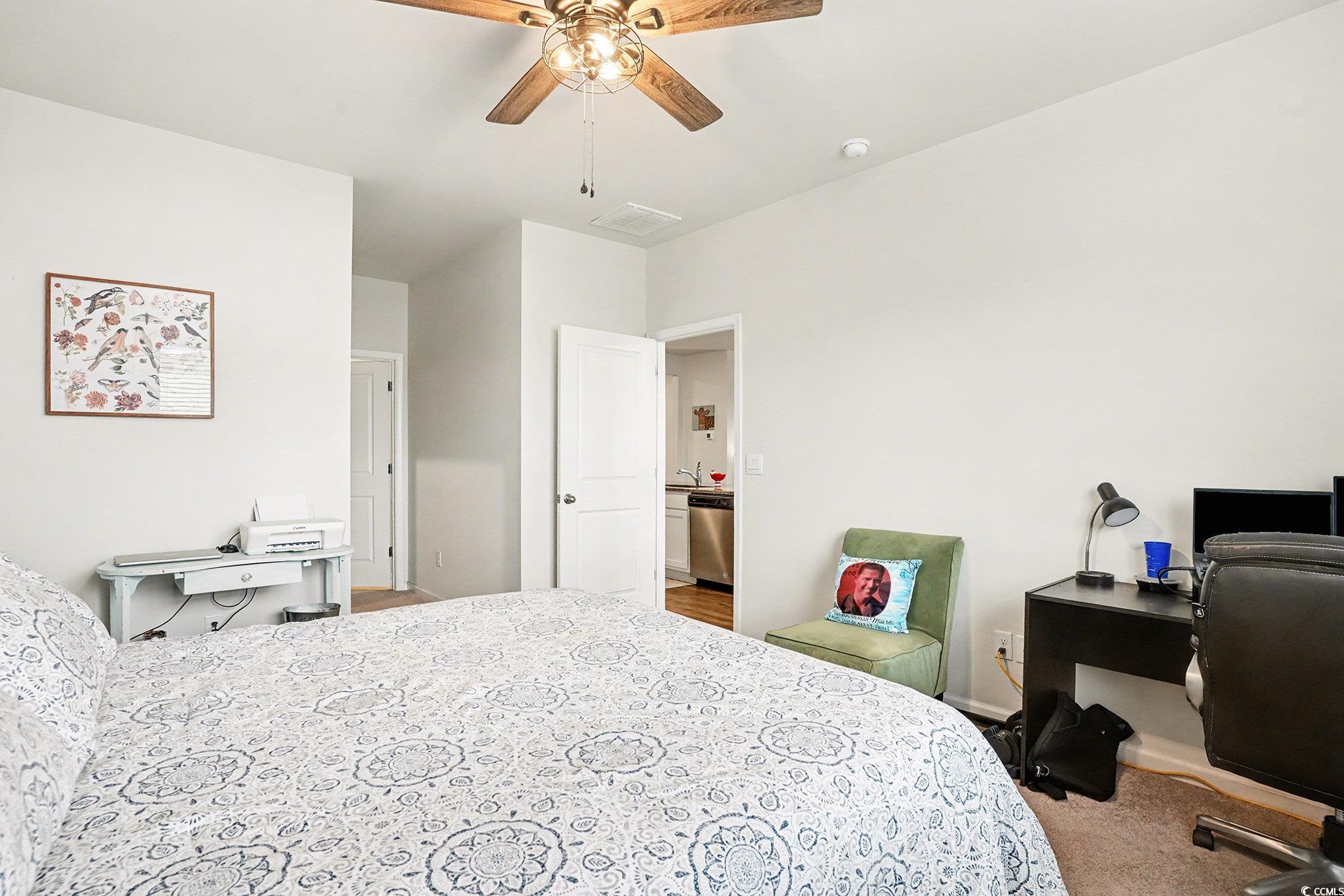 3923 Nandina Court Conway, SC 29526 - Photo 14 of 28 Bedroom with light carpet, an office area, and ceiling fan