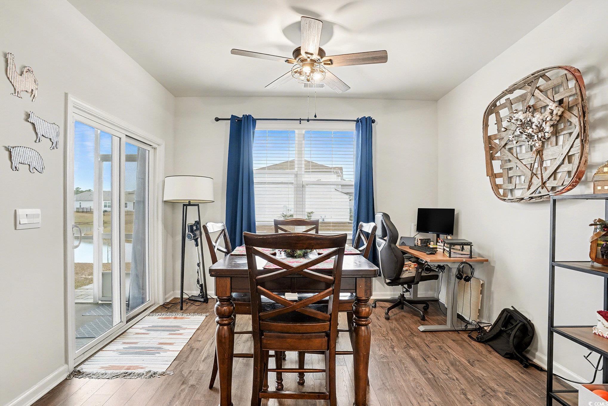 3923 Nandina Court Conway, SC 29526 - Photo 9 of 28 Dining space with an office area, wood finished floors, and ceiling fan