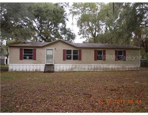 3305 Margo Burt Road Lakeland, FL 33810 - Photo 1 of 1 a view of a house with a yard